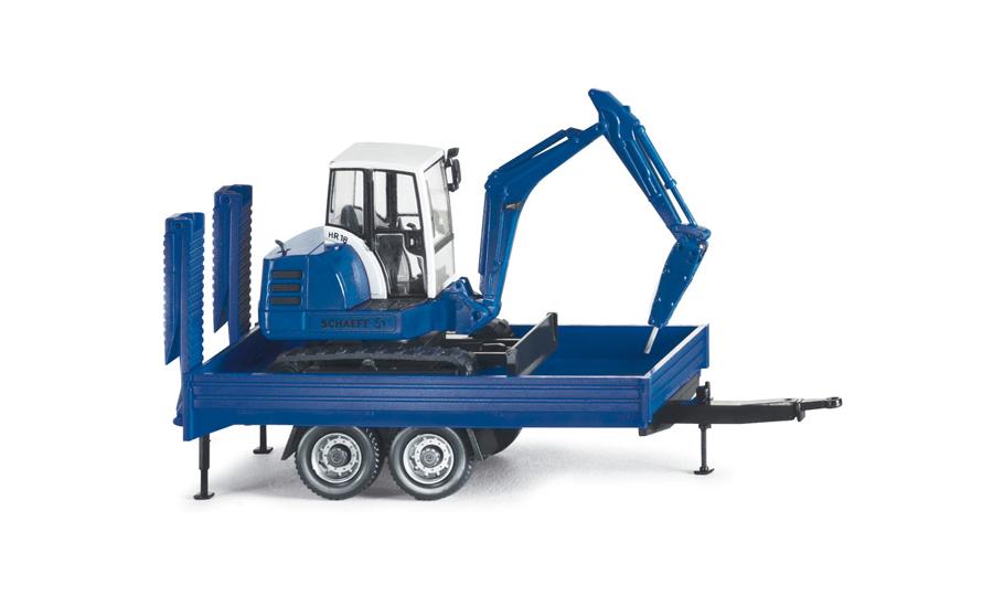 Mini-Bagger m. Hydraulikhammer auf Tandemtrailer - enzianblau